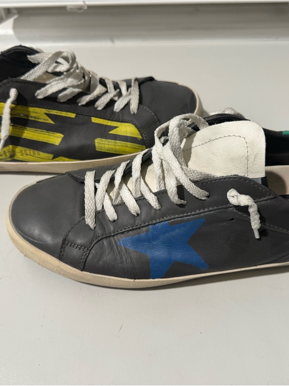 Golden Goose Men's Gray Sneakers with Blue Star and Yellow Accents